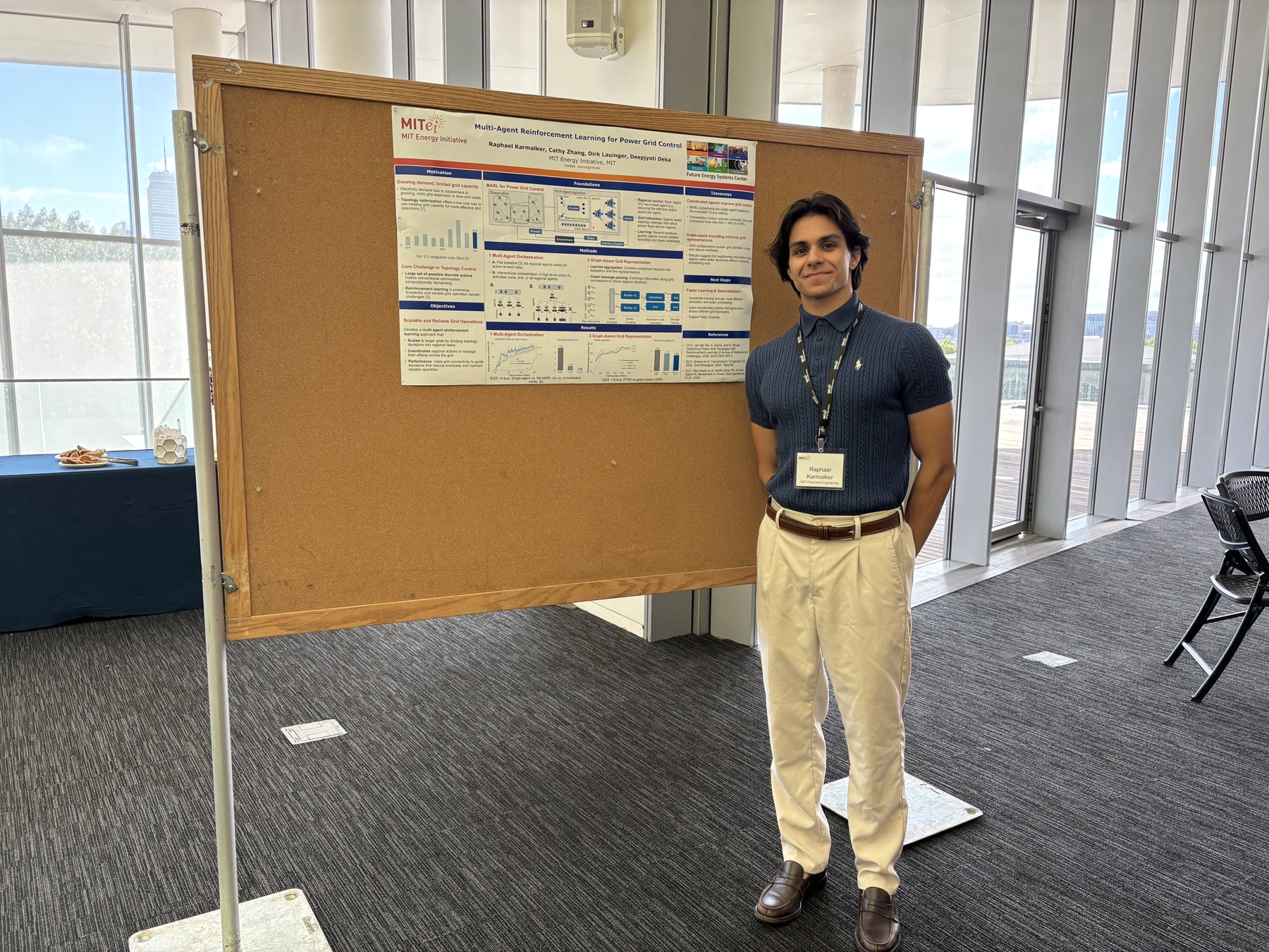 Raphael beside his multi-agent reinforcement learning poster at MIT